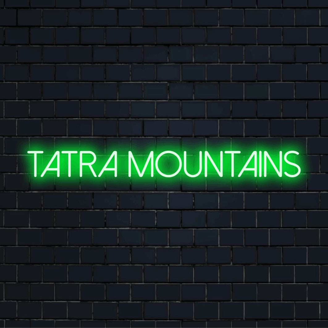 Tatra Mountains Neon Sign, glowing neon text on dark brick wall