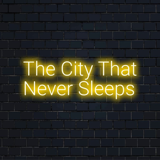 The City That Never Sleeps LED Neon Sign, bright LED glow on black brick background