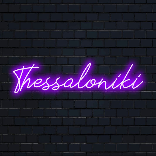 Thessaloniki Neon Light with bright LED glow on dark brick background