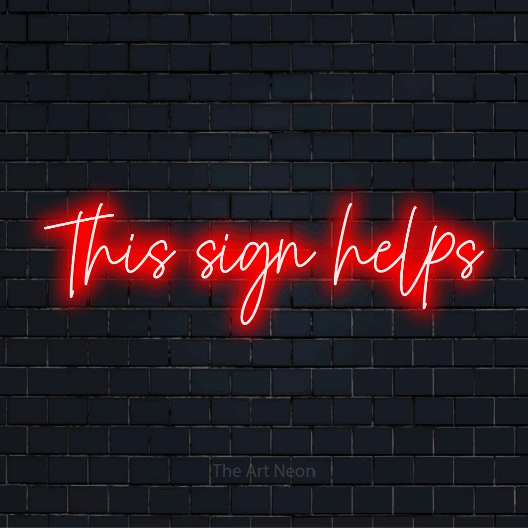 "This Sign Helps" text design with neon effect on a black brick wall