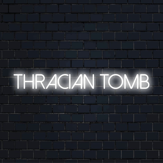 Thracian Tomb Neon Sign, glowing lettering on black brick background