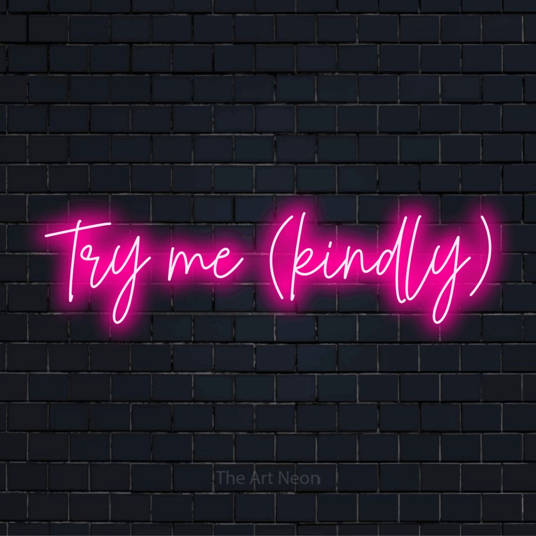 "Try Me (kindly)" LED neon sign on a black brick wall