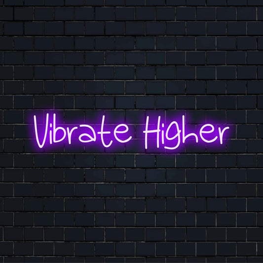 Vibrate Higher LED Neon Sign, soft neon glow against brick backdrop