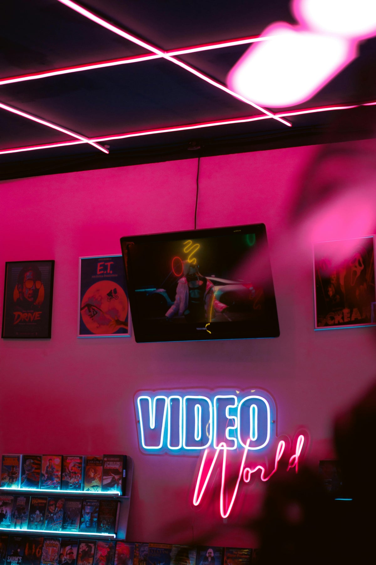 Custom VIDEO logo LED neon sign in a pink content studio