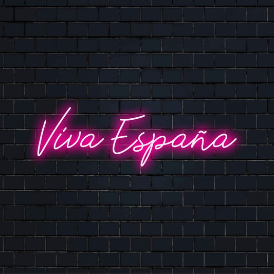 Viva Espana LED Neon Sign, glowing wall decor on dark brick wall