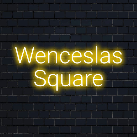 Wenceslas Square Neon Sign, glowing lettering against brick backdrop