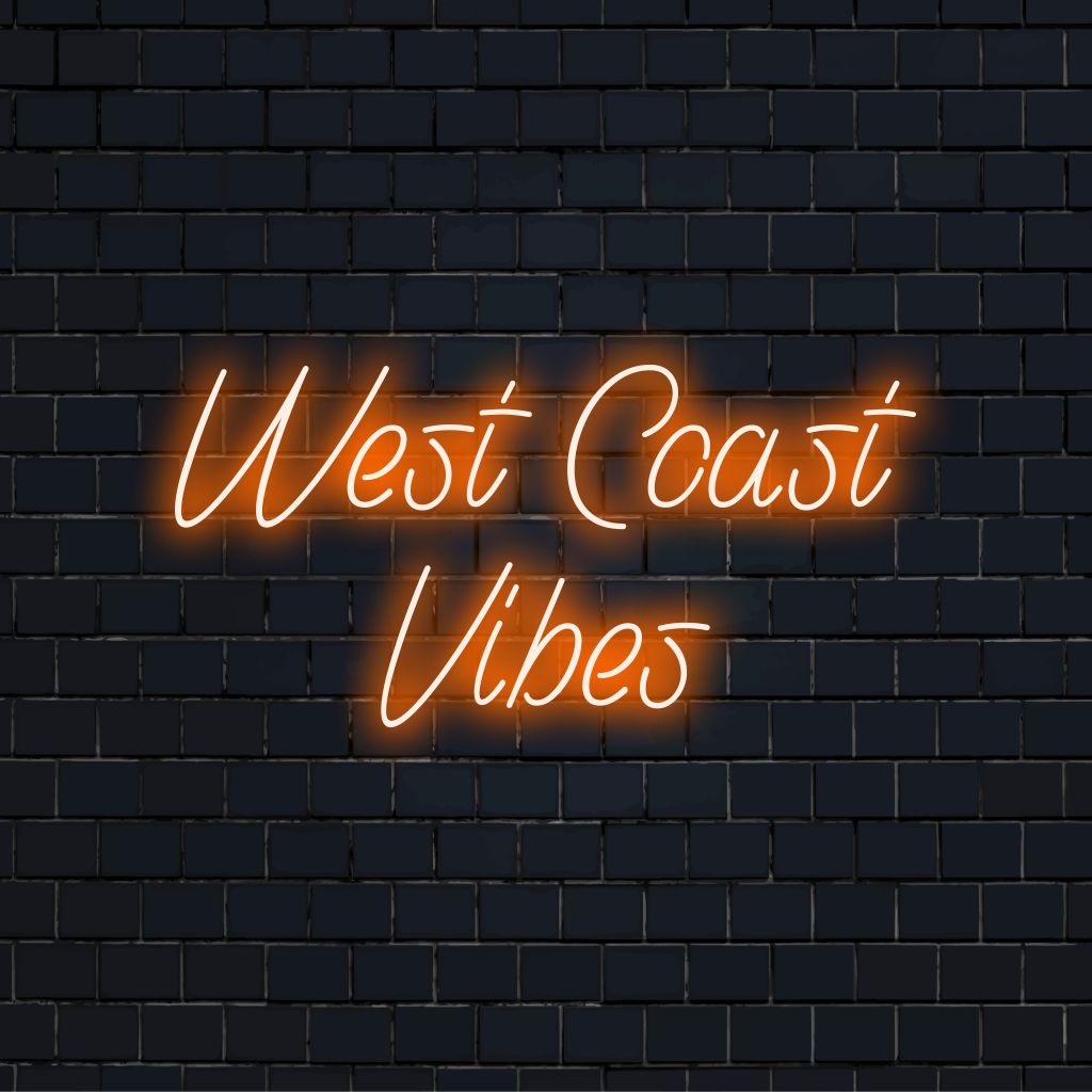 West Coast Vibes Neon Sign, bright neon lettering against black brick wall