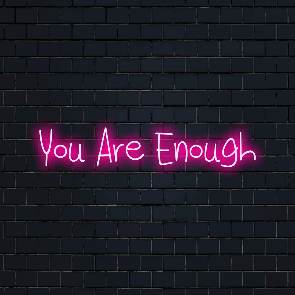 You Are Enough LED Neon Sign, soft neon glow on black brick background