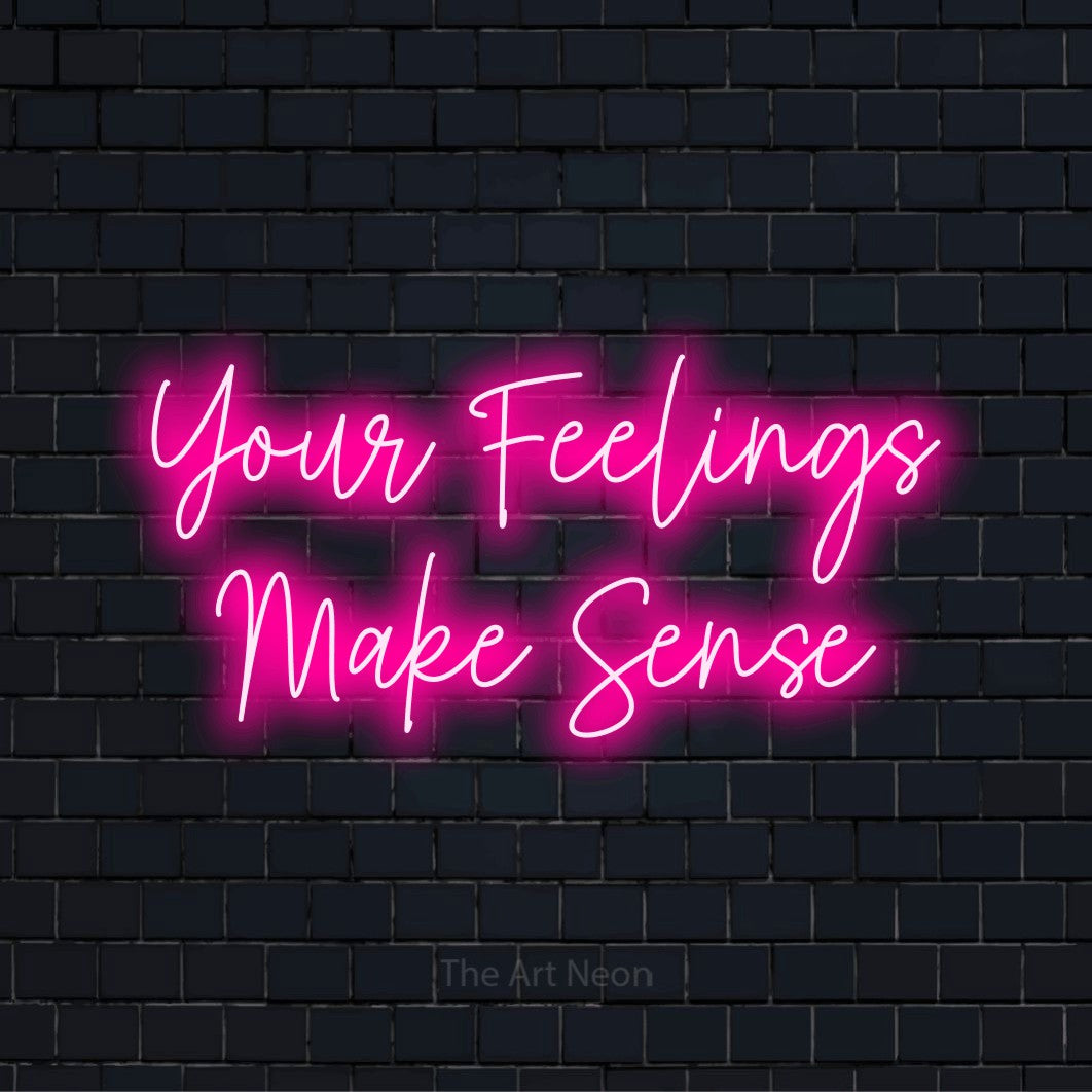 "Your Feelings Make Sense" text design with neon effect on a black brick wall